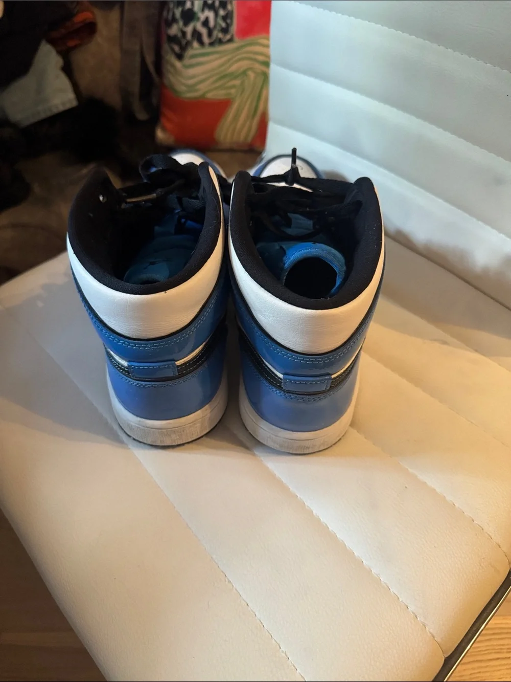 Men’s blue and white Jordan’s patent leather